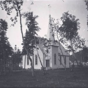 The first church built in Little Bay in 1879. It was originally Presbyterian but given by the Presbyterians to the Methodists as the town's demographs changed. The photographer was Robert Edward Holloway and the picture was taken in 1900.