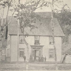 A picture of the Lind Family. Frank "Mayo" Lind is the kid leaning on the fence on the right.