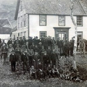 Pay Day at the mine. Likely taken around 1886. My guess on the photographer is Otis Boyden. The house in the background was the home of the Lind family.